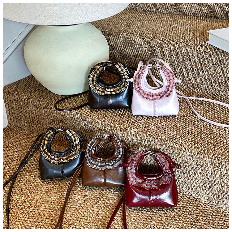 Damen Mini-Handtasche mit modischem Rüschendesign Nord Taschen