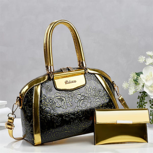 Damen modische Handtasche mit floralen Prägungen und Glanz-Akzenten Nord Taschen