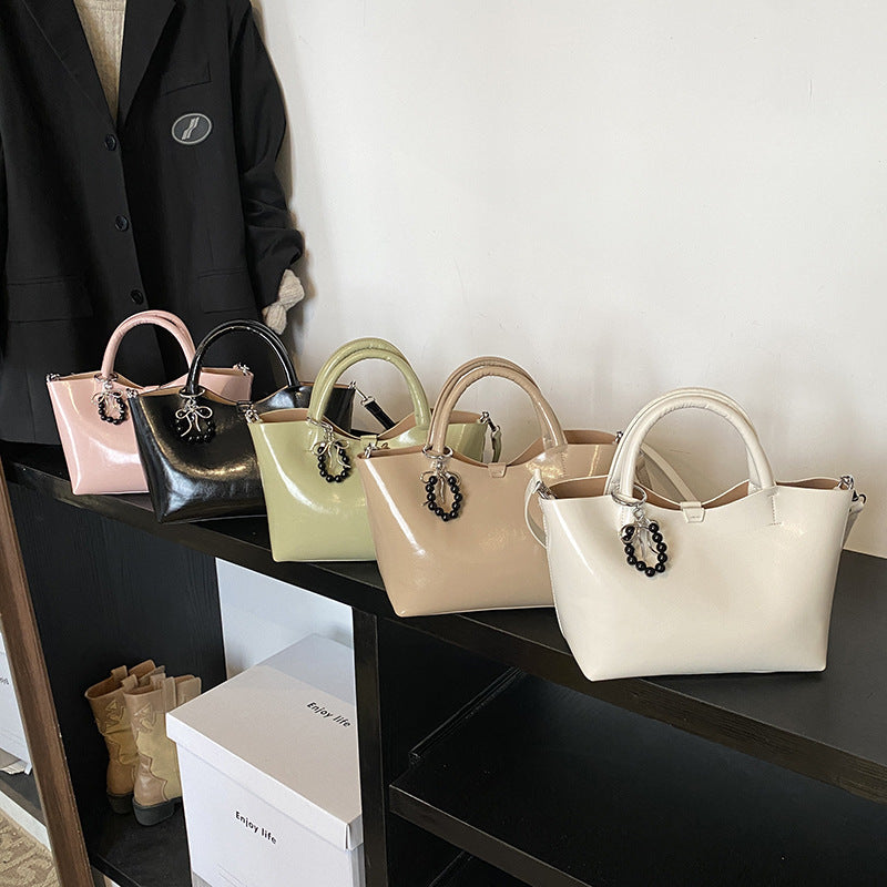 Damen elegante Handtasche mit hochwertiger Lackoberfläche Nord Taschen