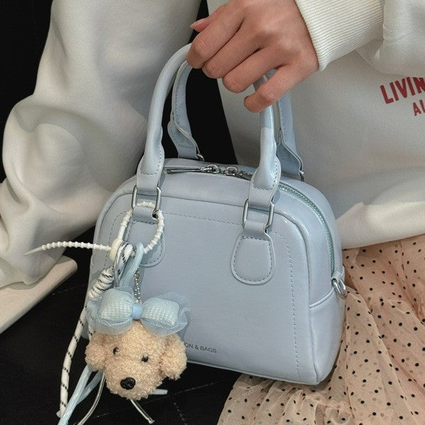 Damen modische Handtasche mit verspieltem Äffchenanhänger Nord Taschen