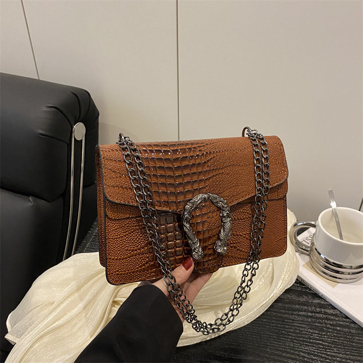 Damen elegante Handtasche mit stilvollem Schlangenverschluss Nord Taschen