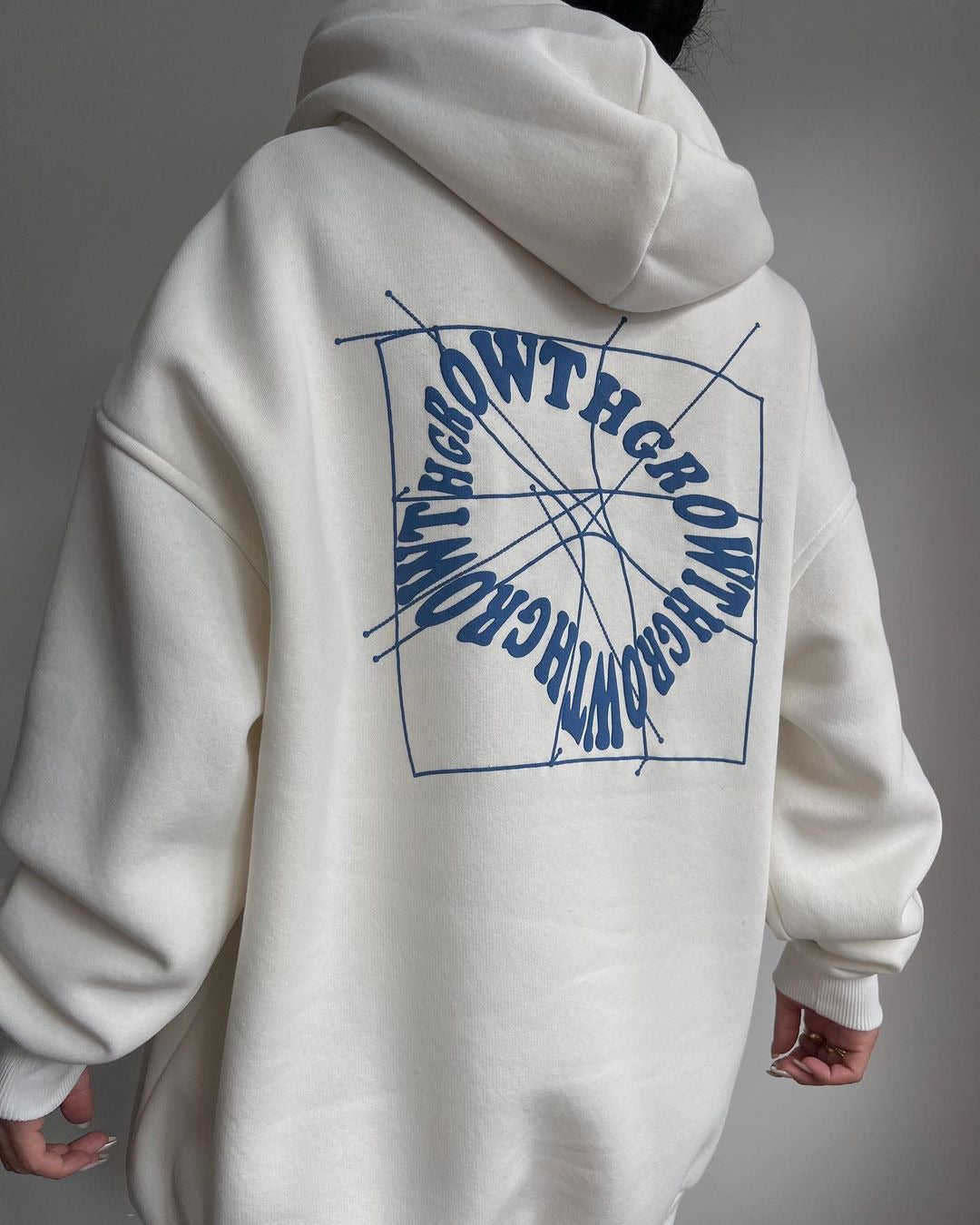 Damen Oversize Kapuzenpullover mit Grafikprint auf dem Rücken Nord Taschen