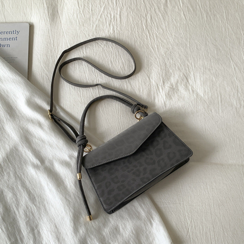 Damen Umhängetasche mit eleganter Leo-Prägung und abnehmbarem Schulterriemen Nord Taschen