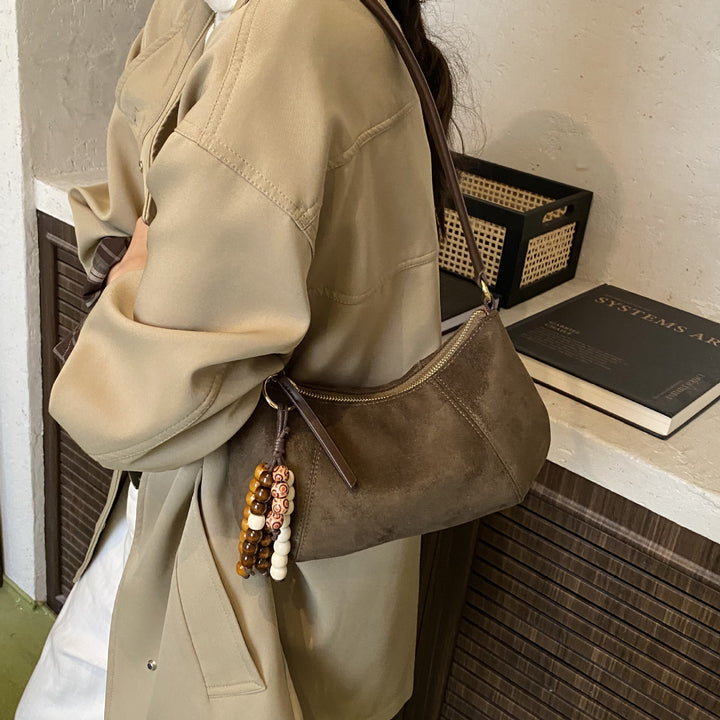 Damen Schultertasche aus weichem Veloursleder mit eleganter Form Nord Taschen