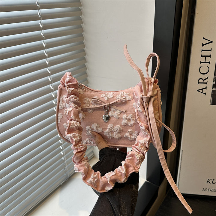 Damen modische Umhängetasche mit floralem Design und raffiniertem Tragegriff Nord Taschen
