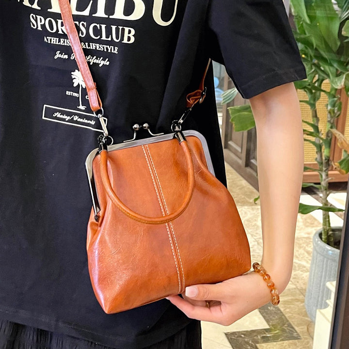 Damen elegante Handtasche mit robustem Metallverschluss Nord Taschen