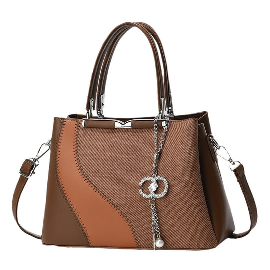 Damen Handtasche aus hochwertigem Kunstleder mit detailverliebtem Design und abnehmbarem Schulterriemen Nord Taschen