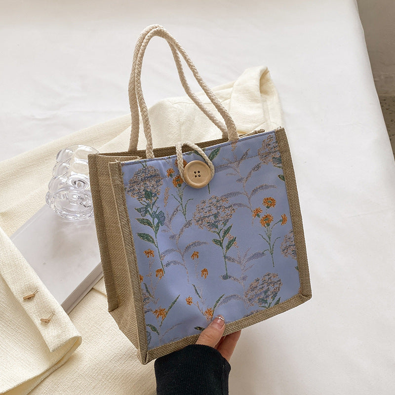 Damen Tragetasche mit floralem Dekor und robusten Materialien Nord Taschen