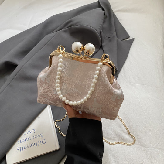 Damen Clutch mit elegantem Perlenschmuck Nord Taschen