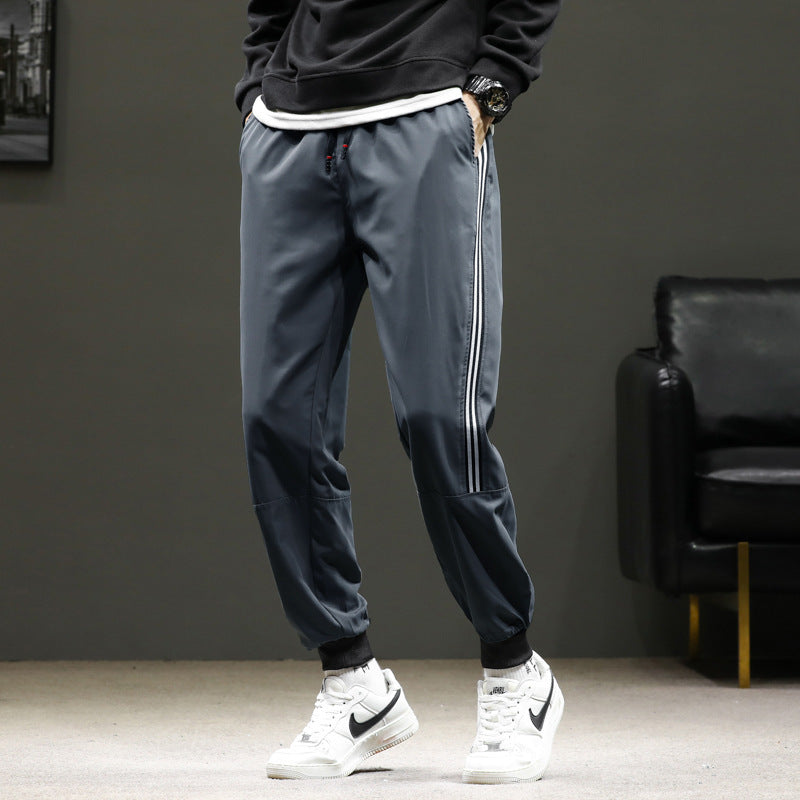 Herren Sportive Jogginghose im Trackstyle mit seitlichen Kontraststreifen, Tunnelzug und elastischen Bündchen Nord Taschen
