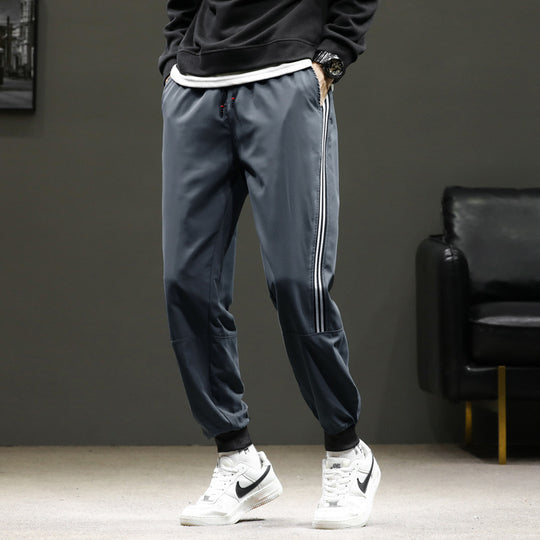 Herren Sportive Jogginghose im Trackstyle mit seitlichen Kontraststreifen, Tunnelzug und elastischen Bündchen Nord Taschen