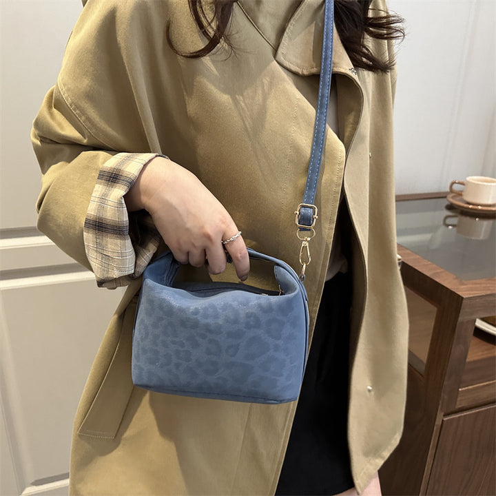 Damentasche mit elegantem Leopardenmuster und wertvollen Details Nord Taschen