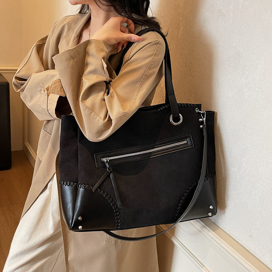 Damen elegante Handtasche mit offenen Seiten und dezenten Lederdetails Nord Taschen