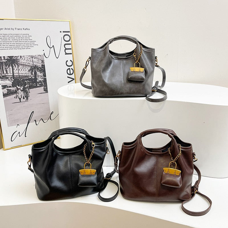 Damen elegante Handtasche mit abnehmbarem Charm Nord Taschen