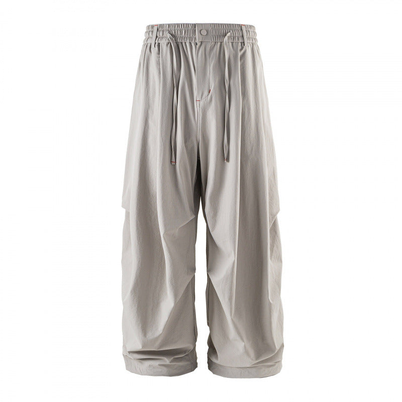 Unisex Weitgeschnittene technische Cargo-Hose mit Gummibund, Kordelzug und Reißverschlusstaschen Nord Taschen