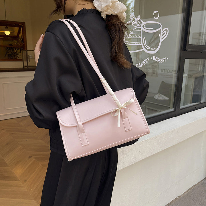 Damen Handtasche aus hochwertigem Kunstleder mit verspieltem Schleifendetail Nord Taschen