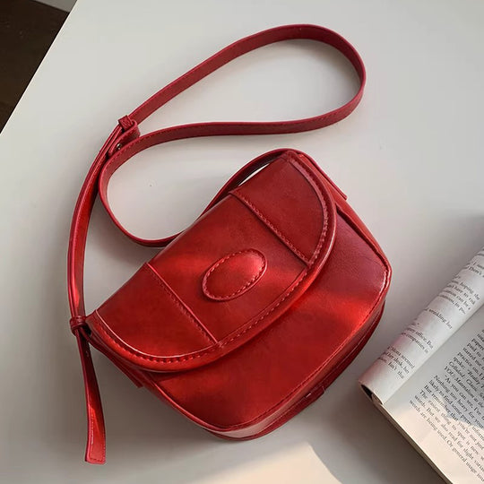 Damen Crossbody-Tasche mit eleganter Klappenöffnung und hochwertiger Lederstruktur Nord Taschen