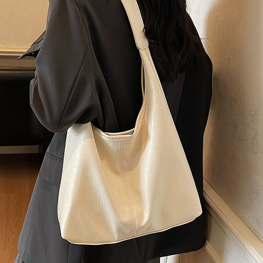 Damen Hobo-Tasche aus weichem Kunstleder mit praktischem Innenteil Nord Taschen