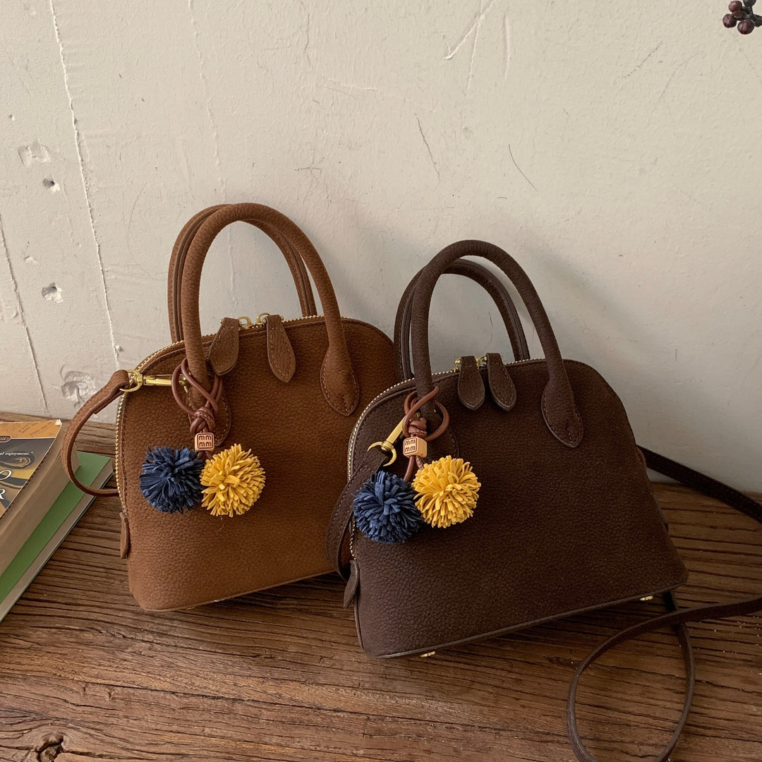 Damen Handtasche mit eleganten Quasten Nord Taschen