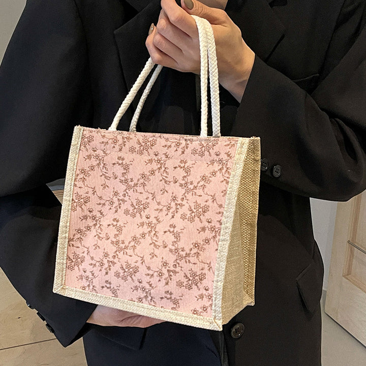Damen Handtasche mit floralem Design und robusten Griffen Nord Taschen