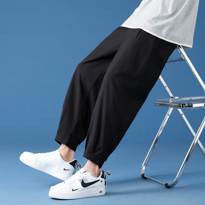 Herren weite technische Jogginghose mit elastischem Bund, gekräuseltem Beinabschluss und atmungsaktivem Stretchmaterial Nord Taschen