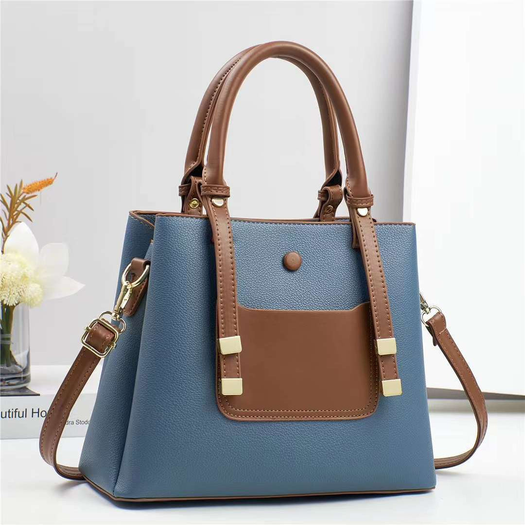 Damen elegante Handtasche mit abnehmbarem Schultergurt und praktischem Frontfach Nord Taschen