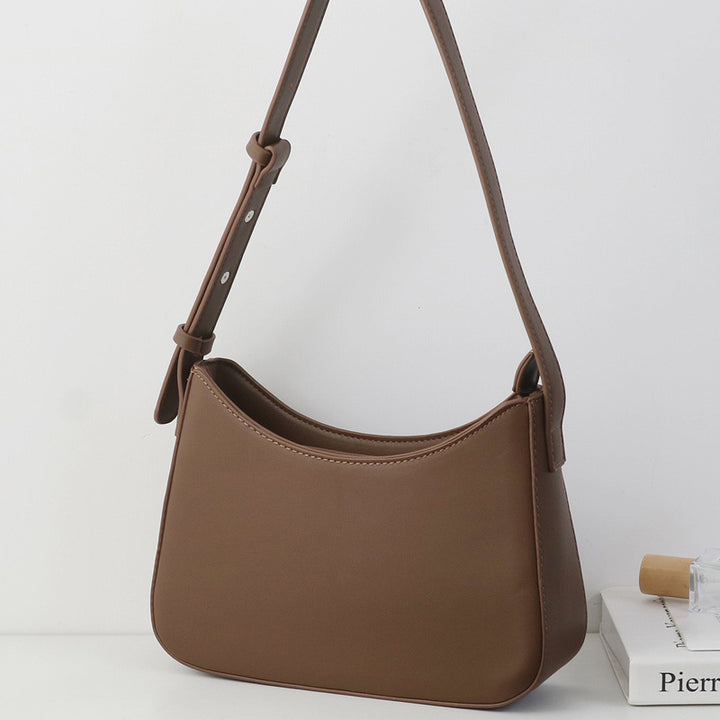 Damen Hobo-Tasche aus strapazierfähigem Kunstleder mit elegantem geschwungenem Design Nord Taschen