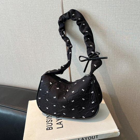 Damen Umhängetasche mit innovativer Schulterriemenstruktur und floralem Design Nord Taschen