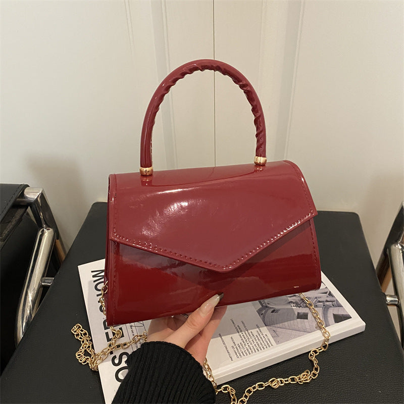 Damen elegante Handtasche im modernen Lacklederdesign Nord Taschen