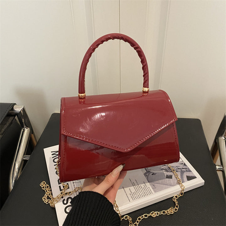 Damen elegante Handtasche im modernen Lacklederdesign Nord Taschen