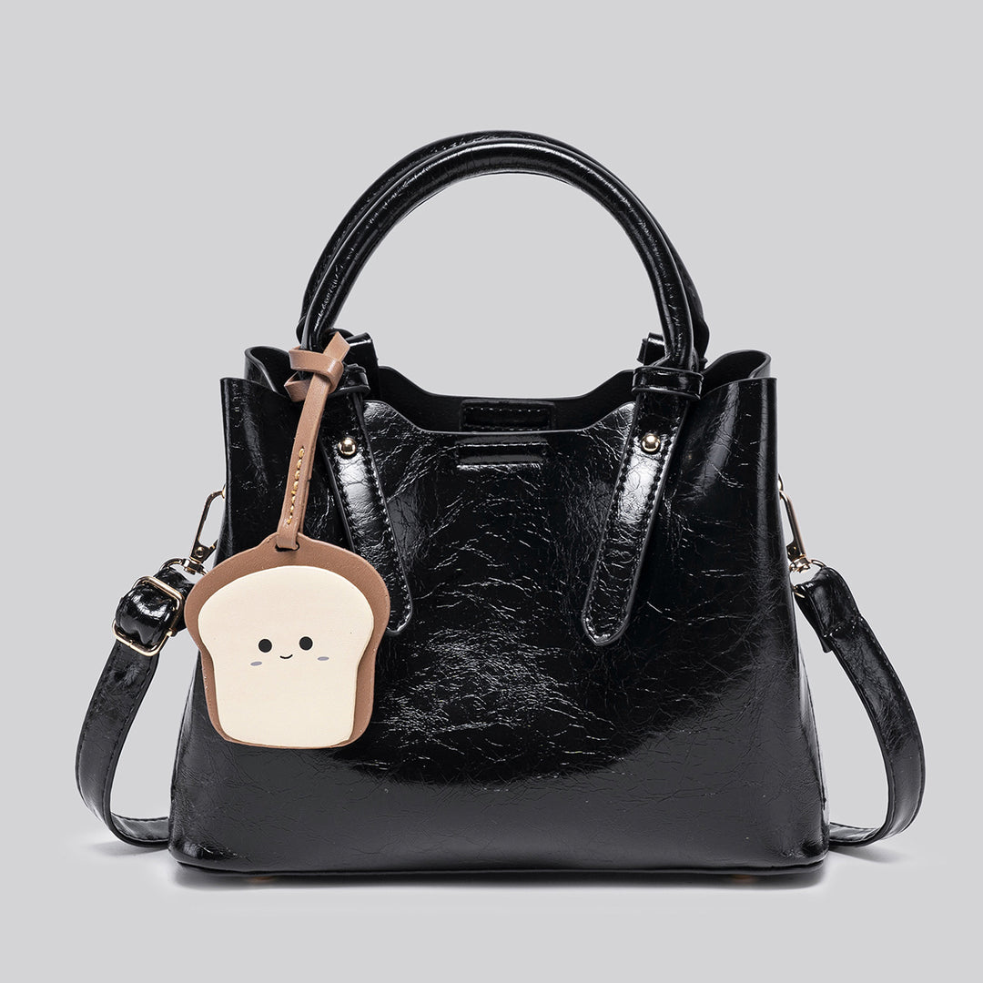 Damen modische Handtasche mit verspieltem Anhänger Nord Taschen