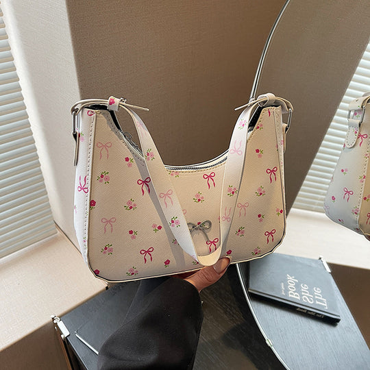 Damen Umhängetasche mit floralen Applikationen und verspieltem Schleifenverschluss Nord Taschen