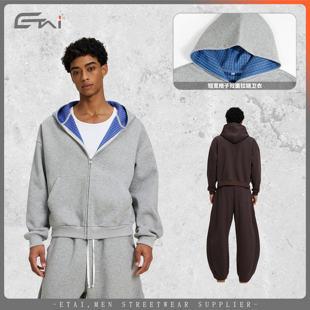 Unisex Kurz geschnittene Oversize-Kapuzenjacke mit durchgehendem Reißverschluss, kariert gefütterter Kapuze und Kängurutasche Nord Taschen