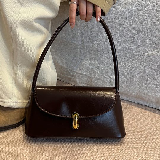 Damen elegante Handtasche mit geschwungenem Design und hochwertigem Kettenverschluss Nord Taschen