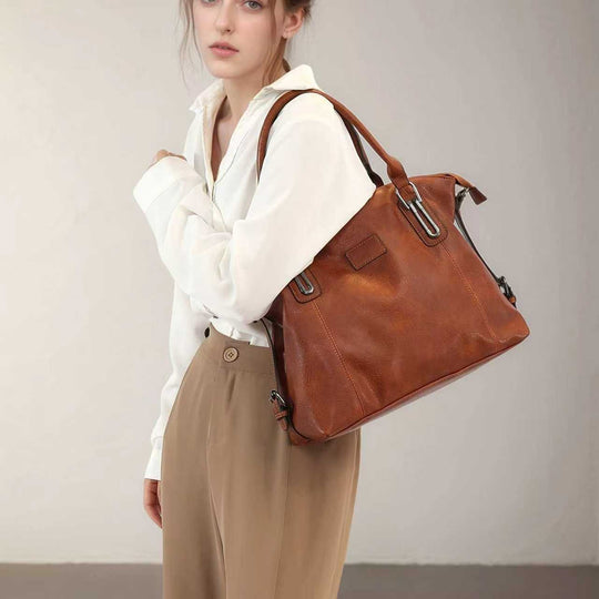 Damen Handtasche mit eleganter Silhouette und praktischer Innentasche Nord Taschen