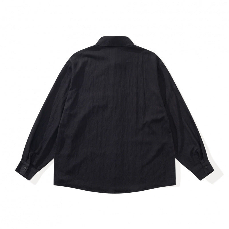 Unisex Oversize-Hemdjacke im Patchwork-Look mit Kentkragen und Brusttasche Nord Taschen