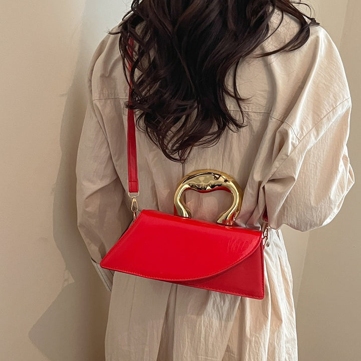 Damen Handtasche mit elegantem Goldgriff Nord Taschen