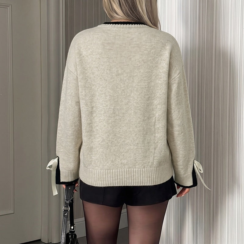 Damen Oversize-Feinstrickpullover mit kontrastgerippter Passe und Schleifen-Details Nord Taschen