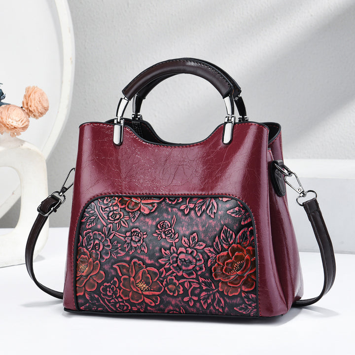 Damen elegante Handtasche mit floralem Relief Nord Taschen
