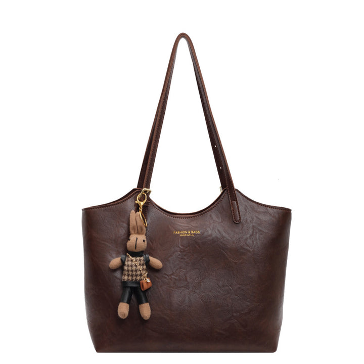 Damen große Handtasche mit verspieltem Stoffanhänger Nord Taschen