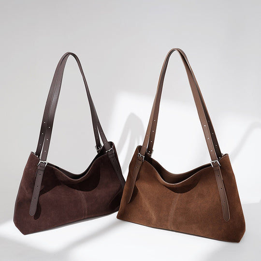 Damen Umhängetasche aus weichem Wildleder mit eleganten Akzenten Nord Taschen