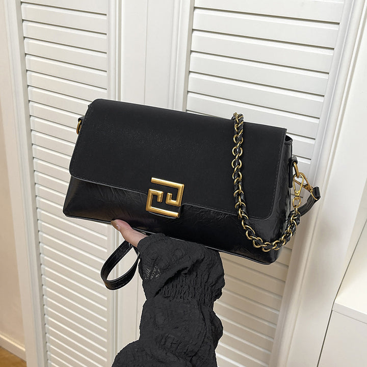 Damen Umhängetasche mit eleganter Verschlussmechanik und luxuriösem Kettenriemen Nord Taschen