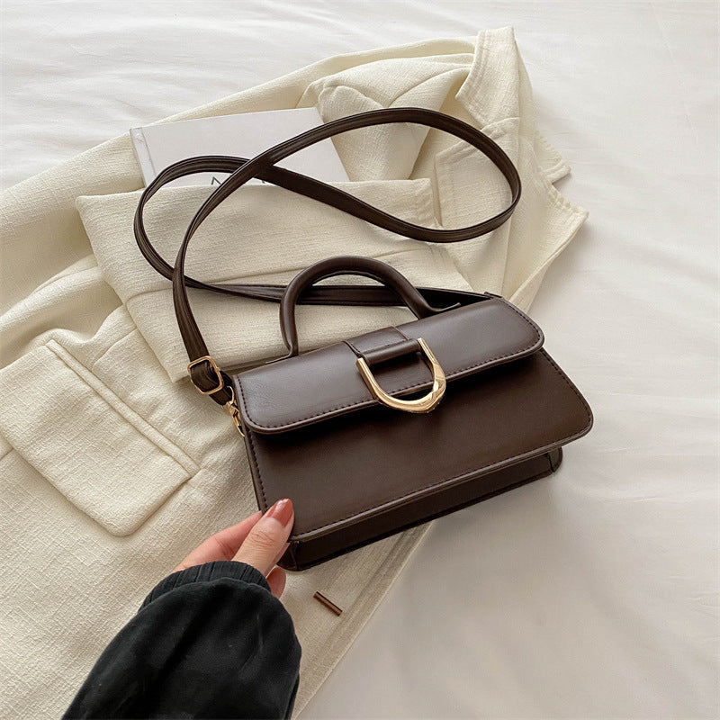 Damen elegante Umhängetasche mit strukturierter Oberfläche und goldenen Akzenten Nord Taschen