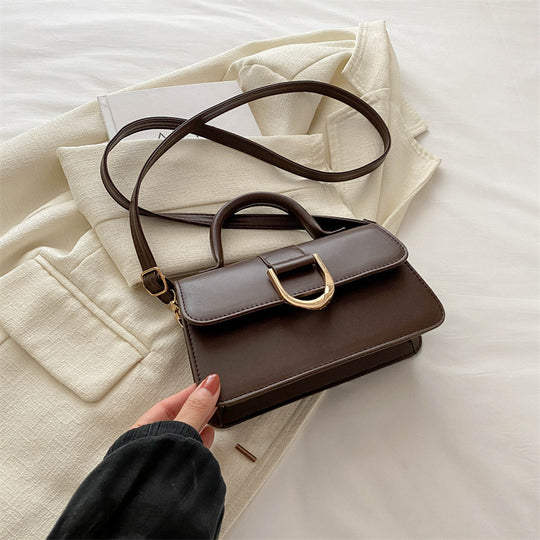 Damen elegante Umhängetasche mit strukturierter Oberfläche und goldenen Akzenten Nord Taschen