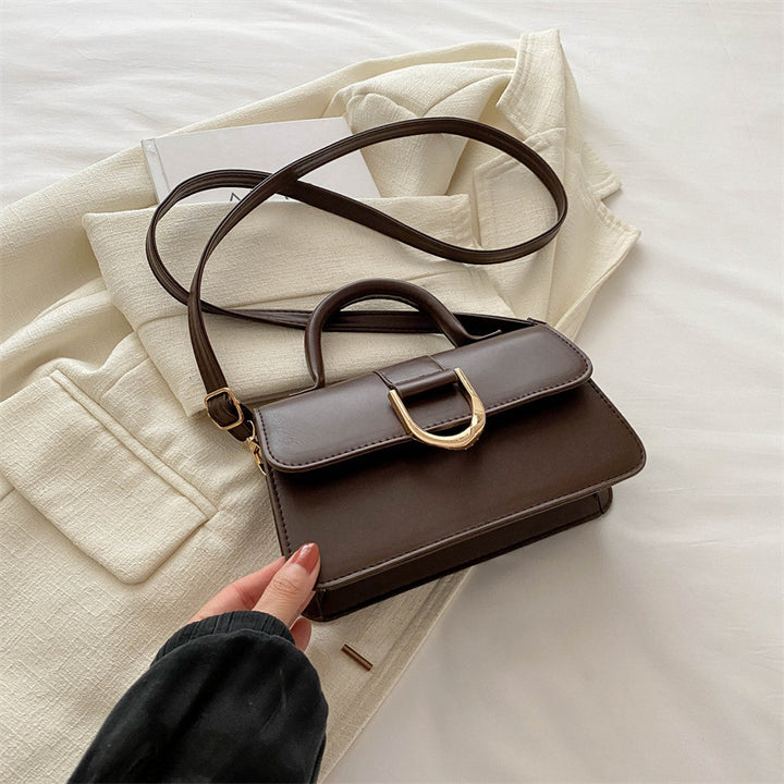 Damen elegante Umhängetasche mit strukturierter Oberfläche und goldenen Akzenten Nord Taschen