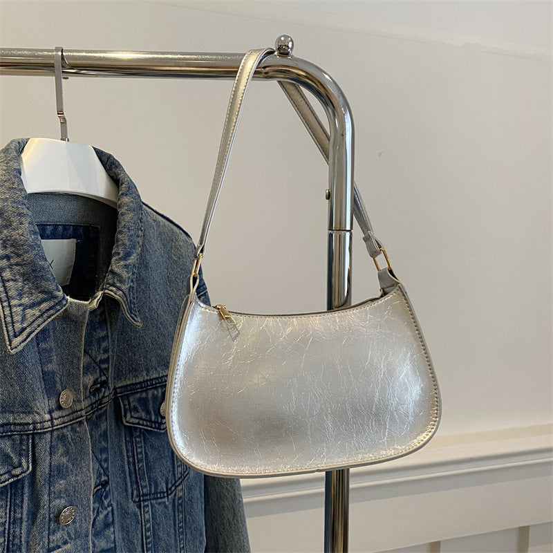 Damen elegante Umhängetasche aus veganem Leder mit minimalistischer Form Nord Taschen