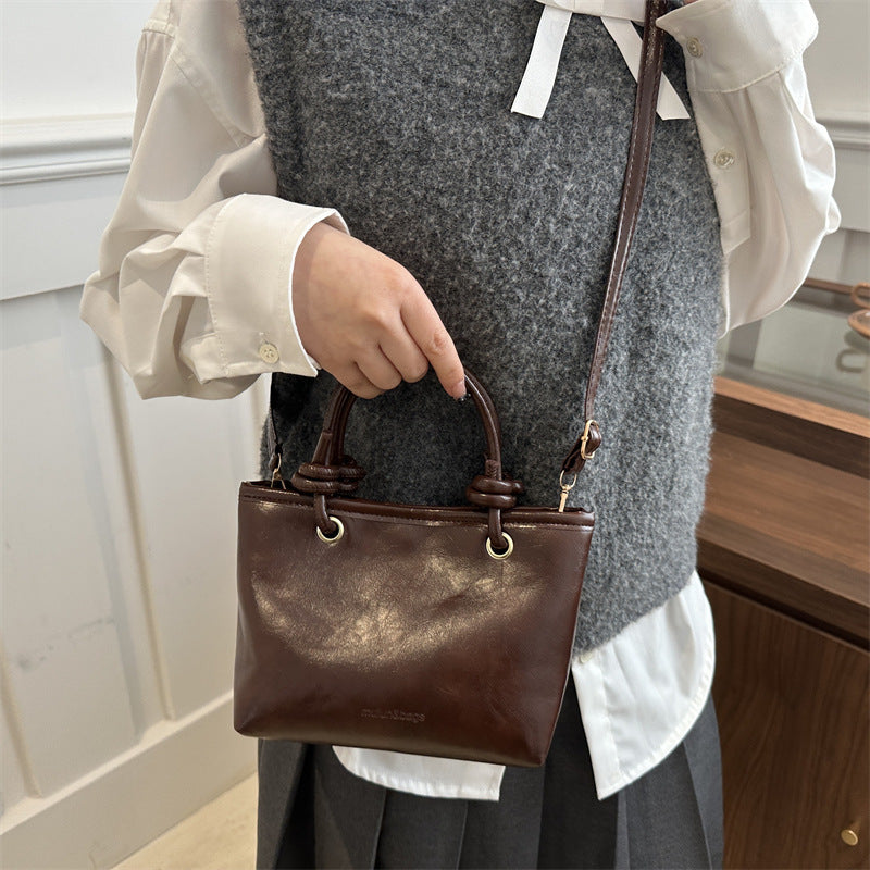 Damen Handtasche mit geflochtenem Tragegriff Nord Taschen