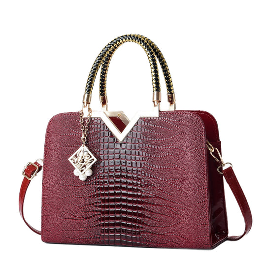 Damen elegante Handtasche mit luxuriöser Croco-Prägung und goldenen Akzenten Nord Taschen