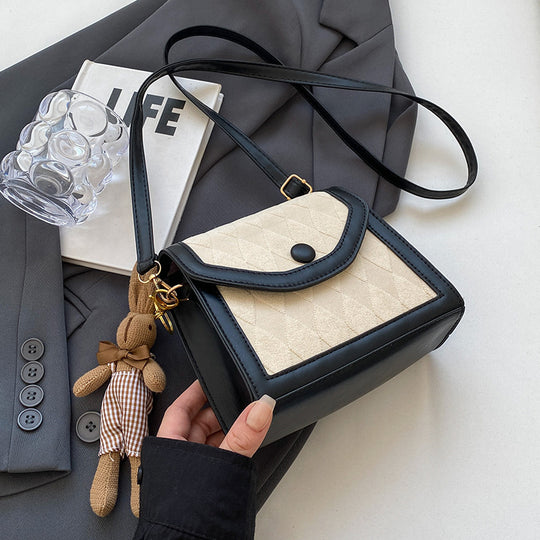Damen modische Umhängetasche mit edlem Rautenstepp Nord Taschen