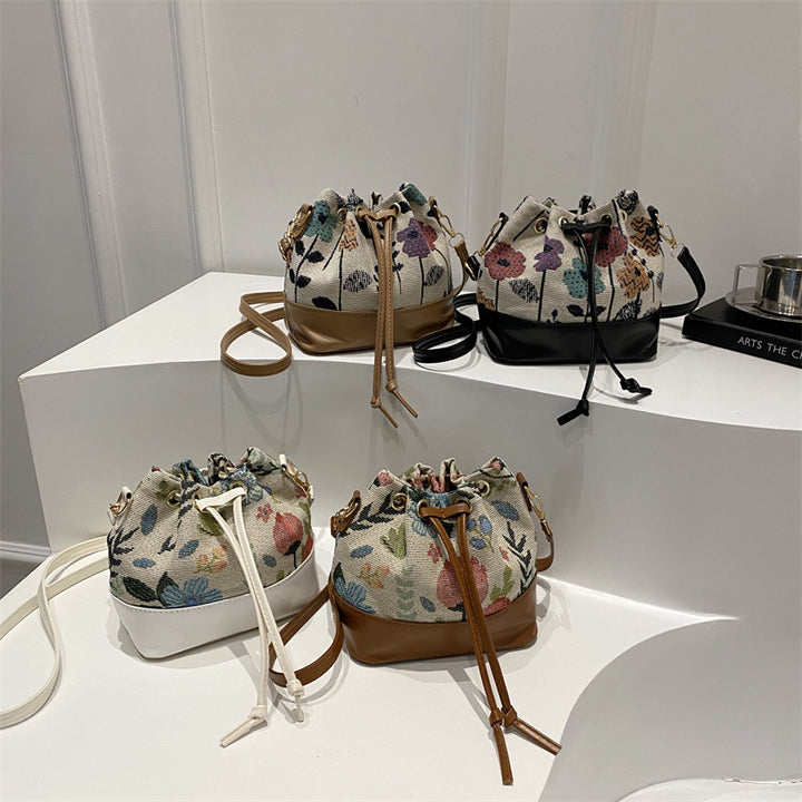 Damen Beuteltasche mit floralem Muster und Lederboden Nord Taschen